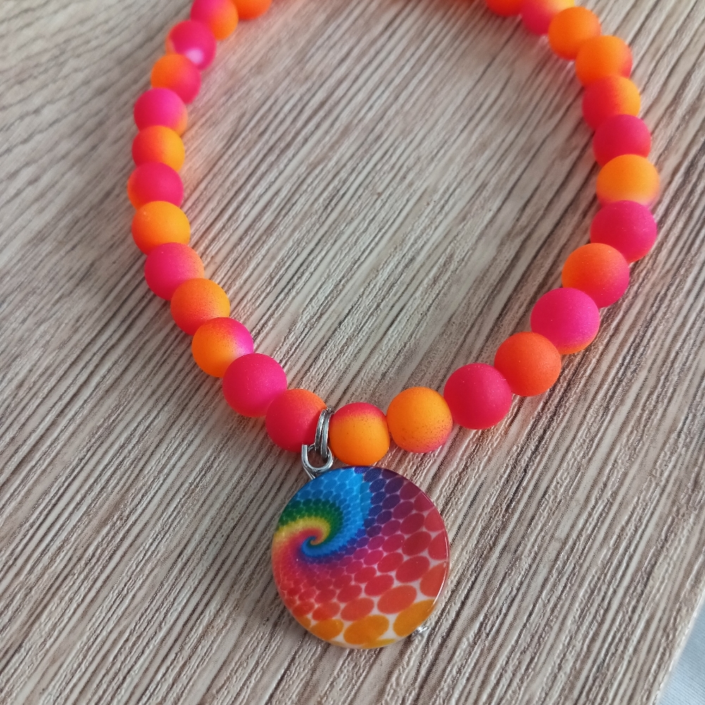 Hand crafted Neon pink and orange tie dye swirl shell beaded statement bracelet